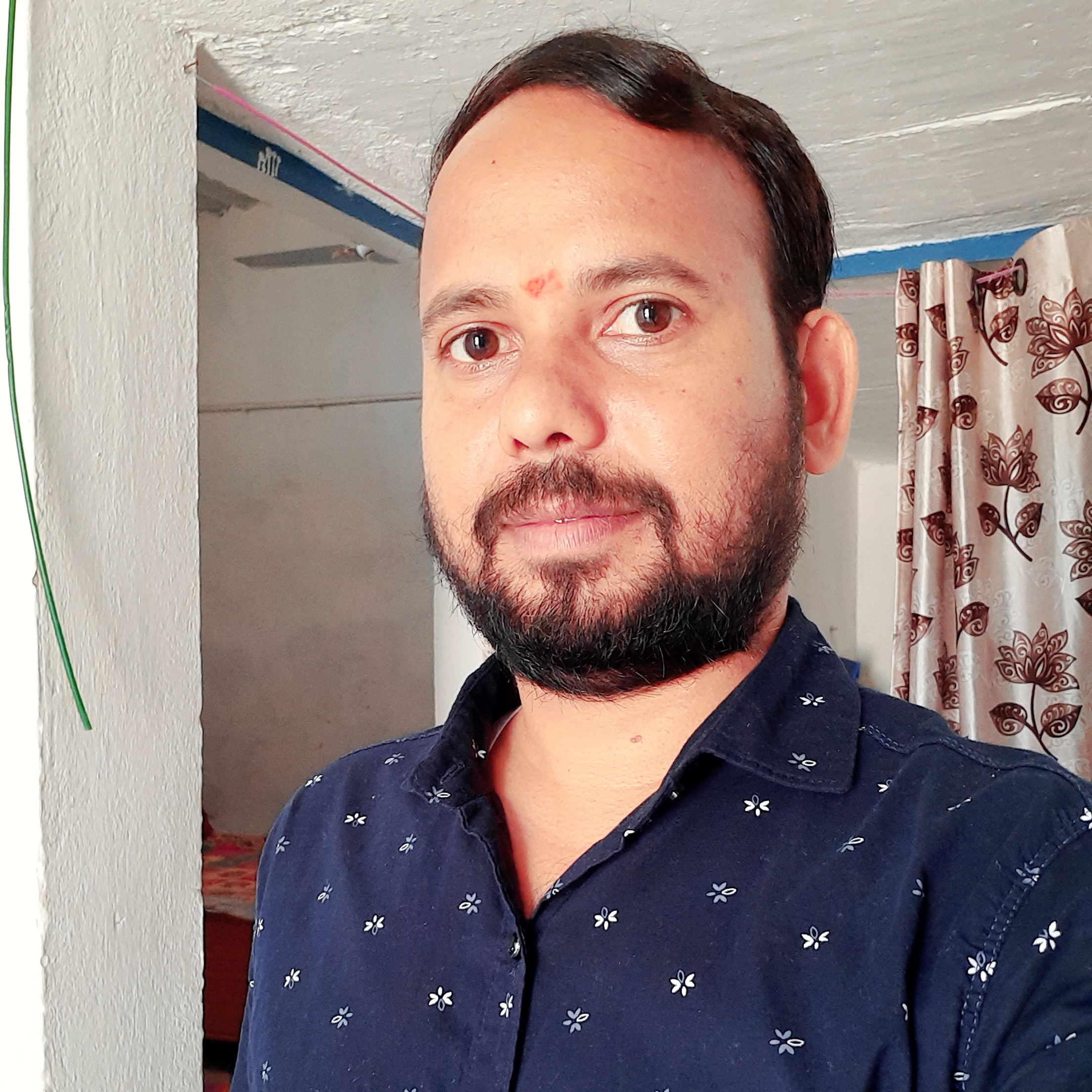 Dr. Pravin Sharma 